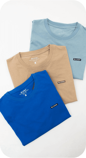 Stacked colorful t-shirts